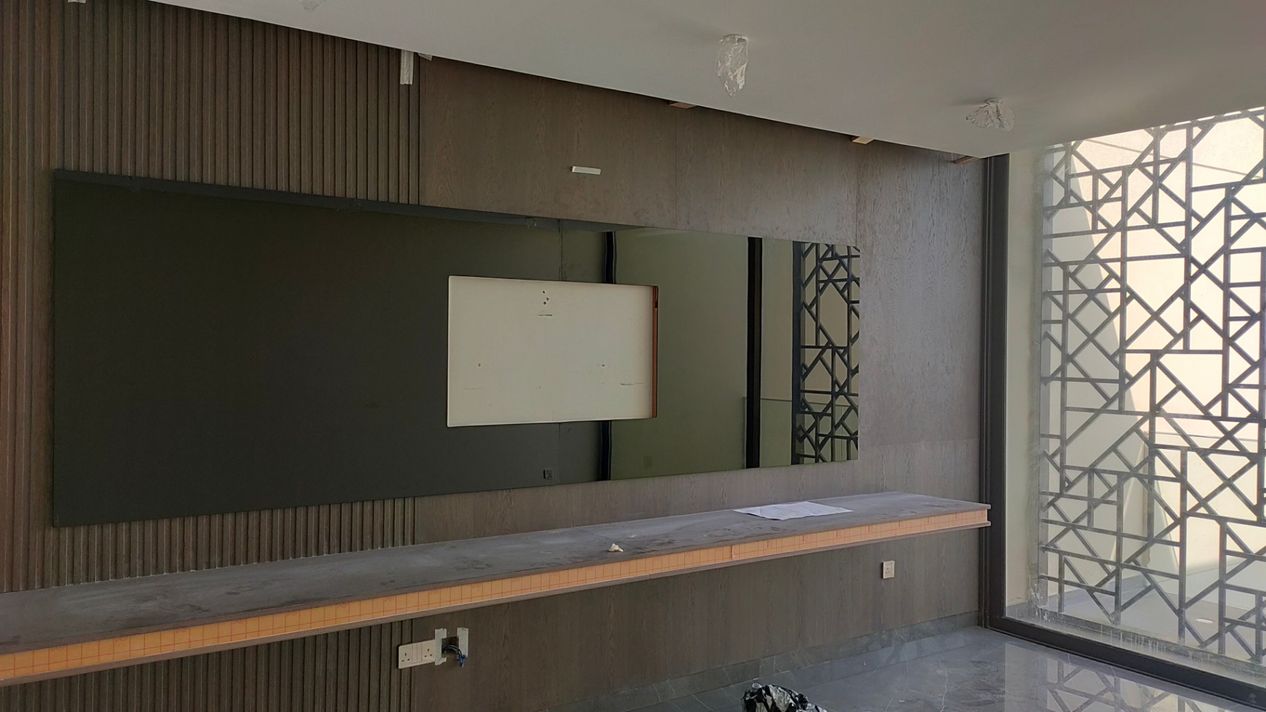 Professionally finished back-painted glass used in a premium commercial interior